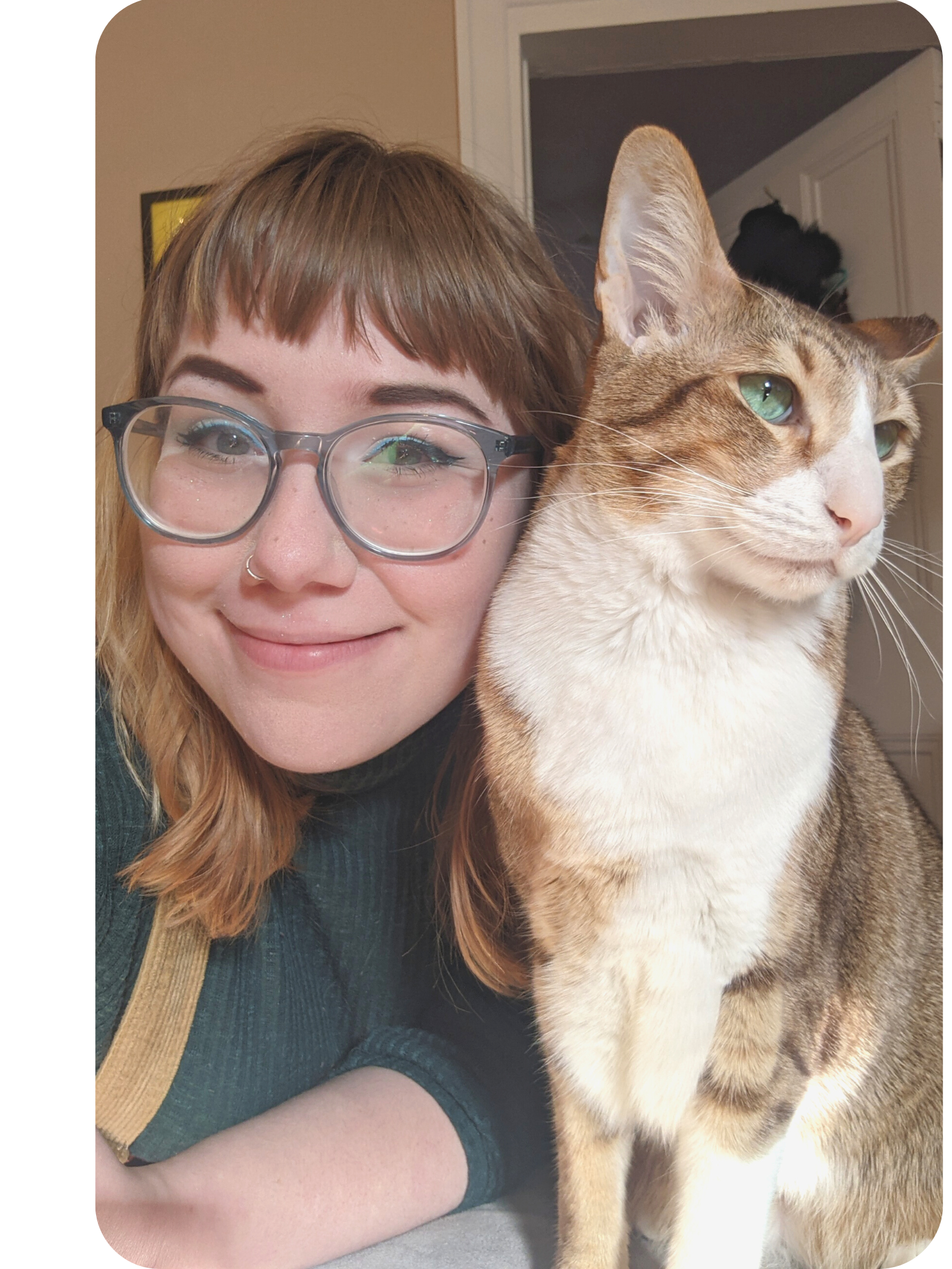photograph of the artist, Mikayla, and her cat, Snickers